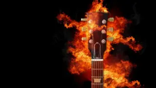 Gitarowa główka otoczona płomieniami, gotowa do zagrania ognistych power chords.