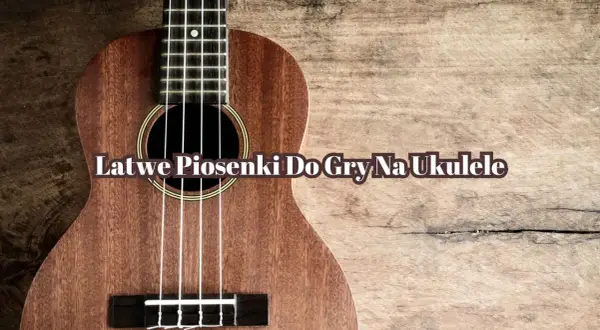 Drewniane ukulele z napisem "Łatwe piosenki do gry na ukulele". Idealne do nauki prostych melodii.