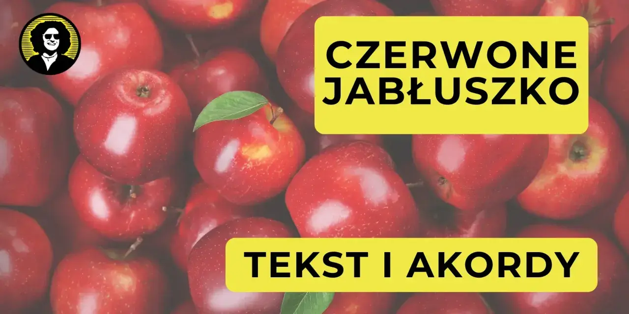 Czerwone jabłuszko, tekst i akordy. W tle mnóstwo soczystych jabłek.